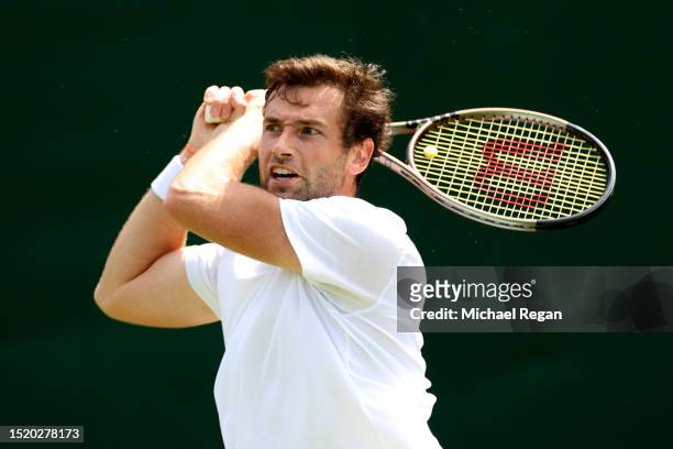 Quentin Halys of France plays a backhand against Aleksandar Vukic of Australia in the Men's Singles second round match during day four of The...
