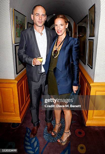 Dinos Chapman and Tiphaine de Lussy attend a private party celebrating the launch of A/W12 AnOther Magazine and the UK opening of Rag & Bone's London...