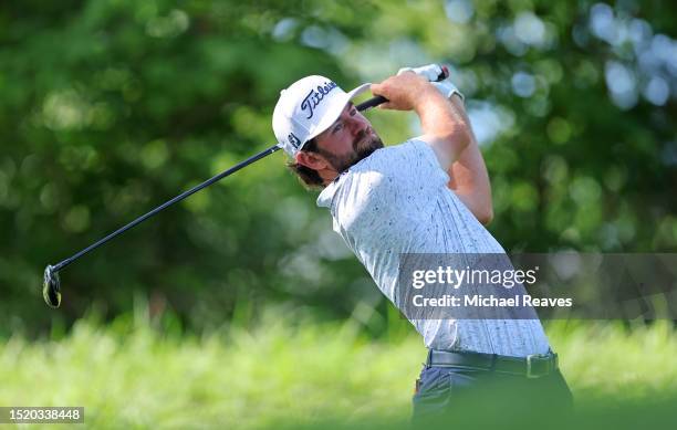 Cameron Young of the United States plays his shot from the 14th tee during the first round of the John Deere Classic at TPC Deere Run on July 06,...
