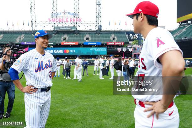 Kodai Senga of the New York Mets and Shohei Ohtani of the Los Angeles Angels talk during the National League Media Availability at T-Mobile Park on...