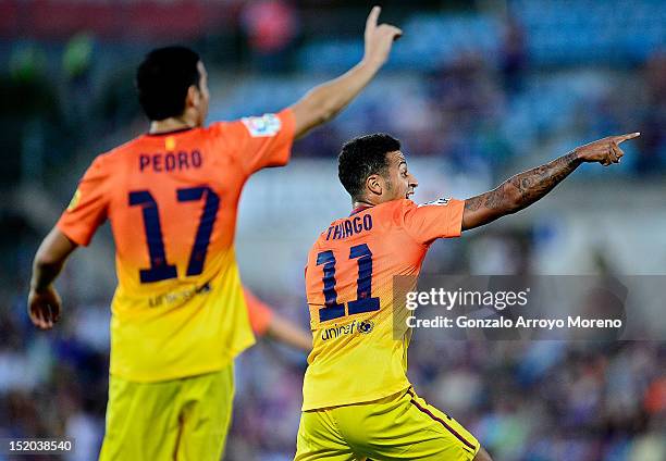 Thiago Alcantara of FC Barcelona reacts with his teammate Pedro Rodriguez Ledesma during the La Liga match between Getafe CF and FC Barcelona at...