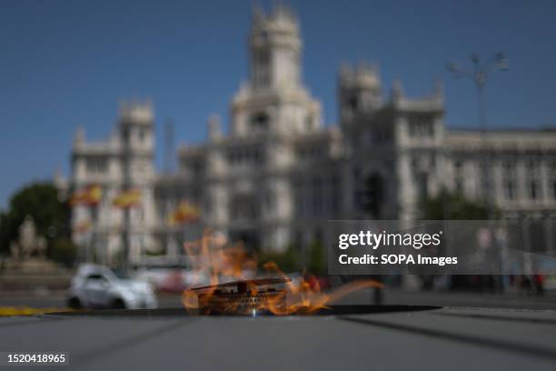The flame in remembrance of the victims of the Covid 19 pandemic remains lit in the Plaza de Cibeles despite the high temperatures in the Spanish...