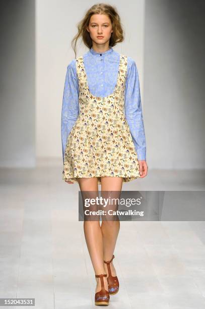 Model walks the runway at the Kinder Aggugini Spring Summer 2013 fashion show during London Fashion Week on September 15, 2012 in London, United...