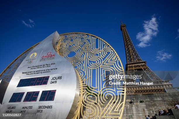 The official Olympic countdown clock with the remaining days and time until the 2024 Summer Olympics near the Eiffel Tower seen on July 06, 2023 in...