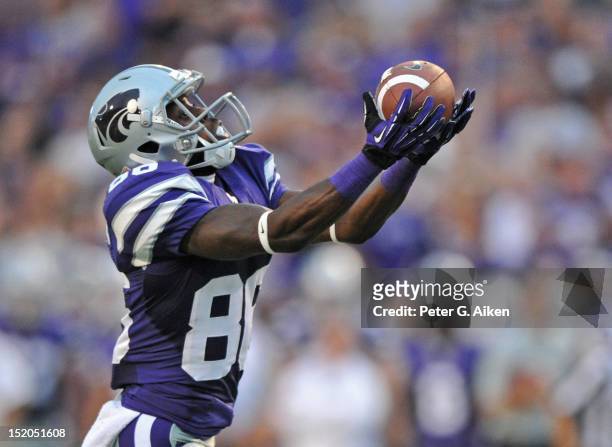 Wide receiver Tramaine Thompson of the Kansas State Wildcats catches a 38-yard touchdown pass against the North Texas Mean Green during the second...