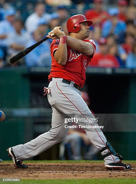 Designated hitter Kendry Morales of the Los Angeles Angels of Anaheim hits a home run in the fifth inning of the game against the Kansas City Royals...