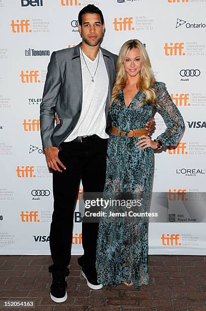 Basketball player Landry Fields of the Toronto Raptors and Elaine Alden attend the "Bad 25" Premiere during the 2012 Toronto International Film...