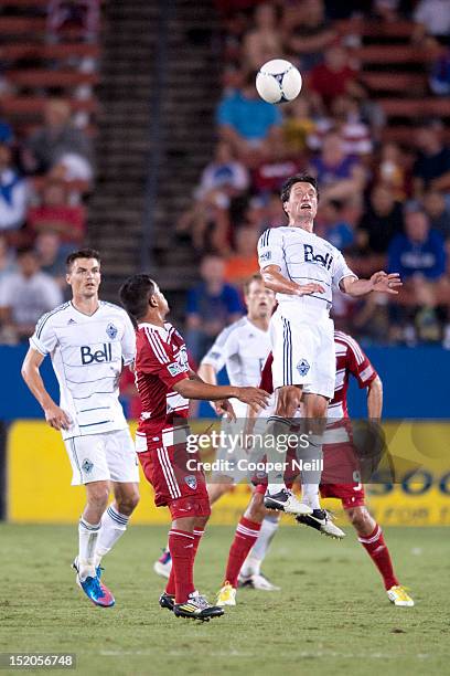 John Thorrington of the Vancouver Whitecaps FC heads the ball against the FC Dallas on September 15, 2012 at FC Dallas Stadium in Frisco, Texas.