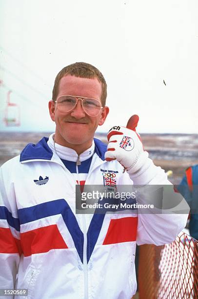 Eddie Edwards of Great Britain gives the thumbs up before the 70 metres Ski Jump event during the 1988 Winter Olympic Games in Calgary, Canada. \...