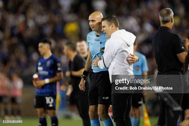 Galaxy head coach and sporting director Greg Vanney questions a call with Fourth Official Sergii Demianchuk during a game between Los Angeles Galaxy...