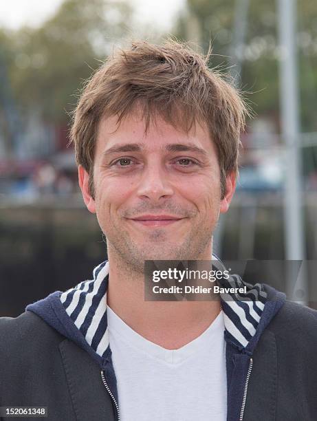 Julien Baumgartner poses during the 'Un petit bout de France' Photocall at La Rochelle Fiction Television Festival on September 15, 2012 in La...