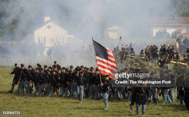 Union Army Re-enactors interpret a recreation of "Bloody Lane" to mark the 150th anniversary of the Battle of Antietam on Saturday September 15, 2012...