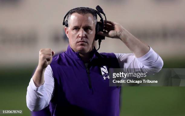 Northwestern coach Pat Fitzgerald pumps his fist after a touchdown against Michigan State on Sept. 3 at Ryan Field in Evanston, Illinois. Fitzgerald...