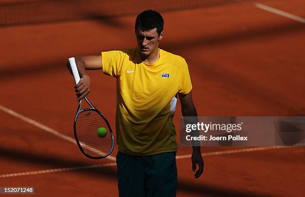 Bernard Tomic of Australia is seen during his match against Florian Mayer of Germany during the Davis Cup World Group Play-Off match between Germany...