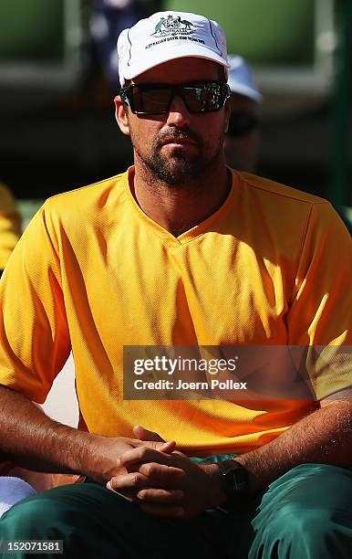 Davis Cup team captain Pat Rafter of Australia looks on during Tomic's match against Florian Mayer of Germany during the Davis Cup World Group...