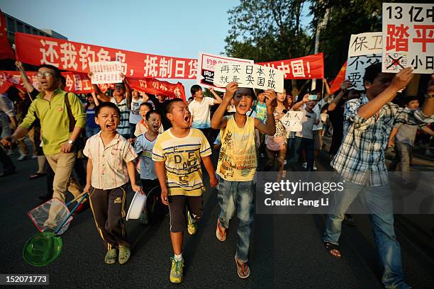 Chinese protestors stage an anti Japan rally outside the Japan Embassy on September 16, 2012 in Beijing, China. Protests have taken place across...