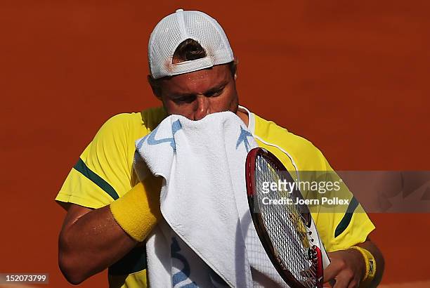 Lleyton Hewitt of Australia gestures during his match against Cedrik-Marcel Stebe of Germany during the Davis Cup World Group Play-Off match between...