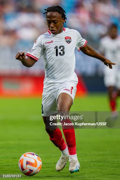 Real Gill of Trinidad and Tobago dribbles the ball during their game against the United States at Bank of America Stadium on July 02, 2023 in...