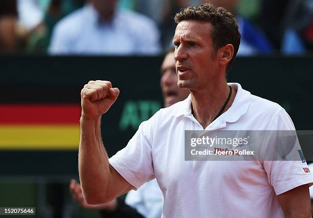 German Davis Cup team captain Patrik Kuehnen celebrates during the Davis Cup World Group Play-Off match between Germany and Australia at Rothenbaum...