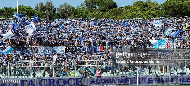 Fans of Pescara show banners during the Serie A match between Pescara and UC Sampdoria at Adriatico Stadium on September 16, 2012 in Pescara, Italy.