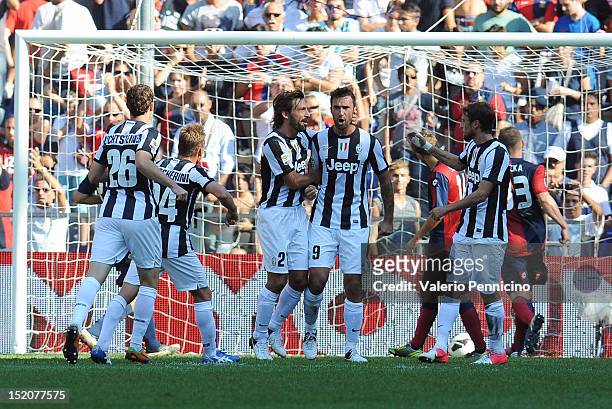 Mirko Vucinic of Juventus FC celebrates with team-mates after scoring during the Serie A match between Genoa CFC and Juventus FC at Stadio Luigi...