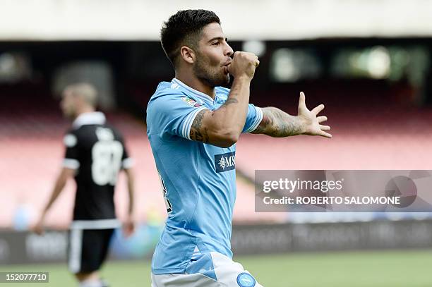 Napoli's forward Lorenzo Insigne celebrates after scoring during the Italian Serie A football match SSC Napoli vs Parma FC on September 16, 2012 at...