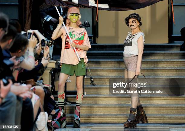 Designer Vivienne Westwood walks on the catwalk by Vivienne Westwood Red Label on day 3 of London Fashion Week Spring/Summer 2013, at the British...