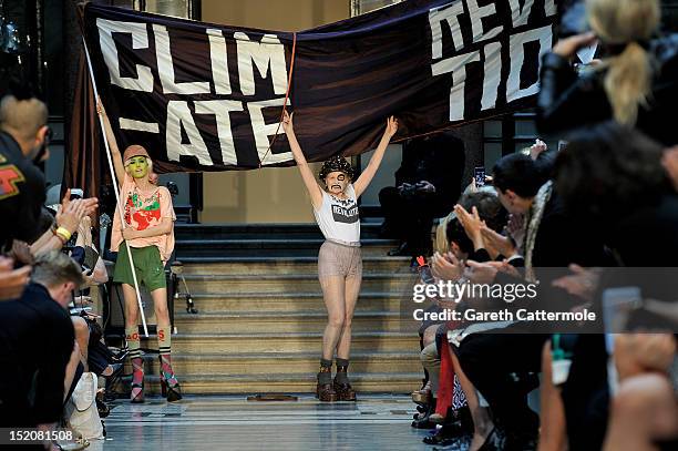 Designer Vivienne Westwood walks on the catwalk by Vivienne Westwood Red Label on day 3 of London Fashion Week Spring/Summer 2013, at the British...