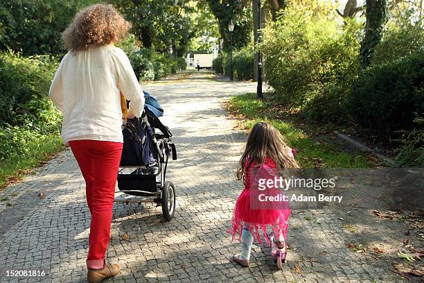 Mother and her three-year-old daughter walk together on September 16, 2012 in Berlin, Germany. Germany is currently debating the introduction of a...