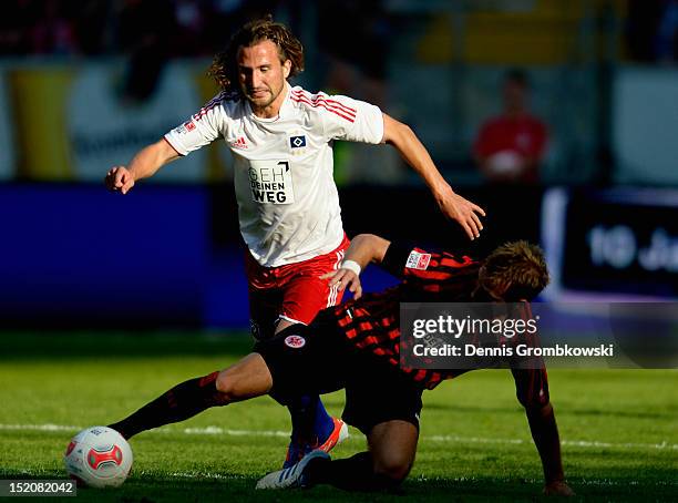 Petr Jiracek of Hamburg and Stefan Aigner of Frankfurt battle for the ball during the Bundesliga match between Eintracht Frankfurt and Hamburger SV...