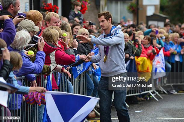 Tennis player Andy Murray returns to Dunblane following his win in the US Open and his gold medal in the 2012 Olympic games in London, on September...