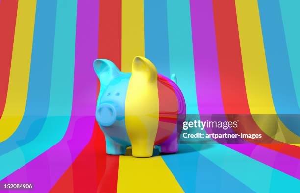 striped piggy bank on striped background - piggy bank stock-fotos und bilder