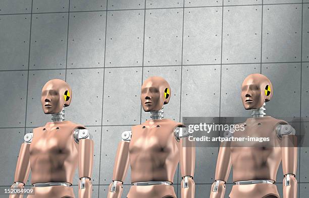 3 crash test dummys in a row - crash test dummies stock pictures, royalty-free photos & images