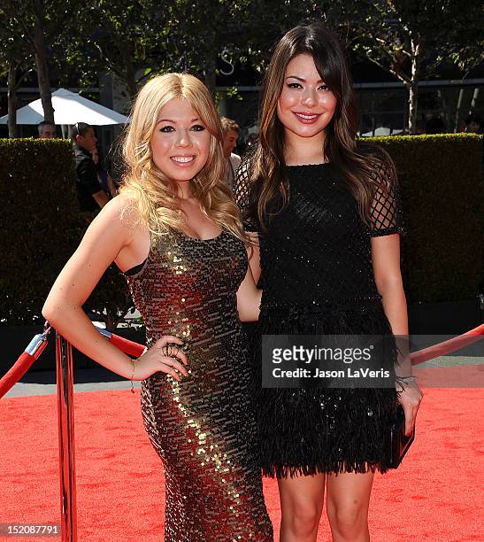 Actresses Jennette McCurdy and Miranda Cosgrove attend the 2012 Primetime Creative Arts Emmy Awards at Nokia Theatre L.A. Live on September 15, 2012...