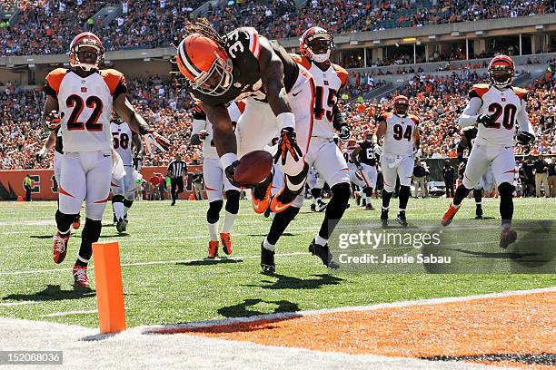 Trent Richardson of the Cleveland Browns flips into the endzone at the end of a 32-yard touchdown run in the first half against the Cincinnati...