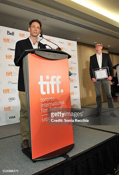 Alliance Films' Mark Slone accepts the Blackberry People's Choice Award for "Silver Linings Playbook" on behalf of filmmaker David O. Russell as TIFF...