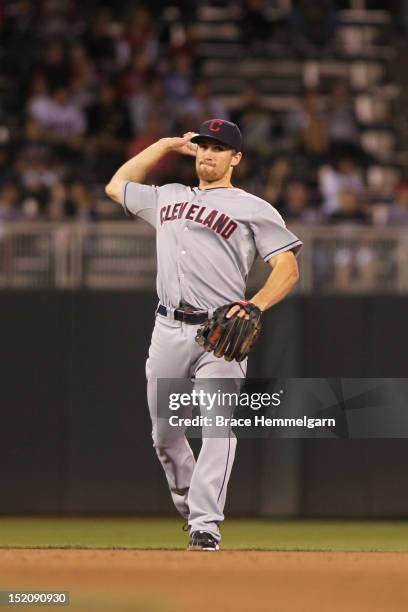 Cord Phelps of the Cleveland Indians throws against the Minnesota Twins on September 10, 2012 at Target Field in Minneapolis, Minnesota. The Twins...