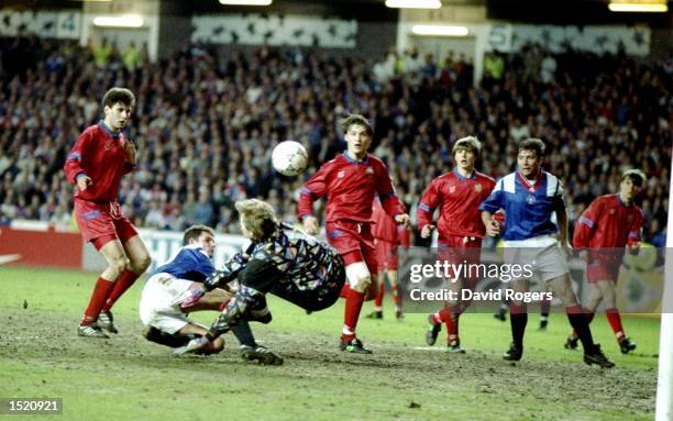 Moscow goalkeeper Plonitkov saves from Ian Durrant of Rangers during a Champions League match at Ibrox Stadium in Glasgow, Scotland. \ Mandatory...