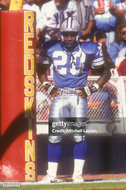 Barry Sanders of the Detroit Lions looks on during a football game against the Washington Redskins on October 22, 1995 at RFK Stadium in Washington,...