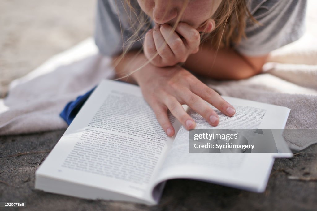 Young Girl reading book