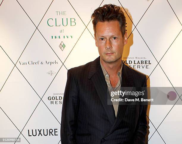 Designer Percy Parker arrives at the Fearless Party with LUXURE Magazine at The Club at The Ivy on September 16, 2012 in London, England.