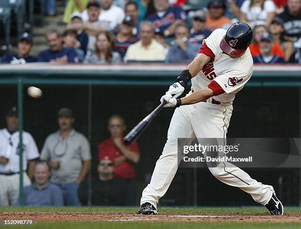 Lonnie Chisenhall of the Cleveland Indians hits a game winning RBI single off of Jose Valverde during the ninth inning of their game on September 16,...