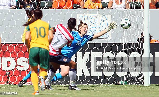 Shannon Boxx of the USA scores on a penalty kick in the second half against goalkeeper Brianna Davey of Australia during the international friendly...