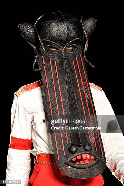 Model showcases designs on the catwalk by Philip Treacy on day 3 of London Fashion Week Spring/Summer 2013, at The Royal Courts Of Justice on...