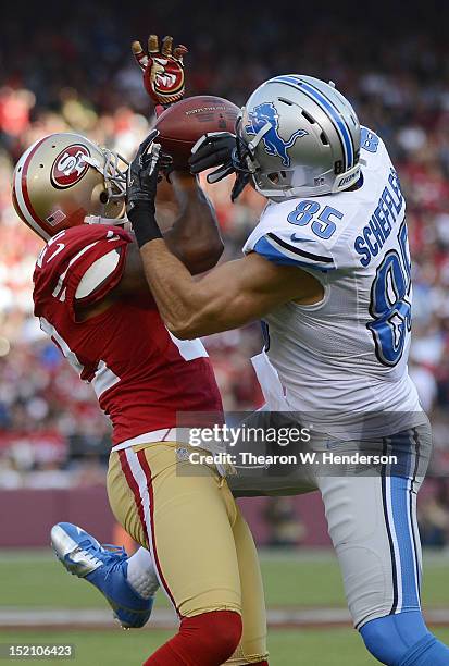 Carlos Rogers of the San Francisco 49ers breaks up a pass to Tony Scheffler of the Detroit Lions in the first quarter of an NFL football game at...