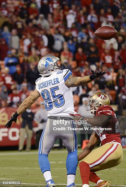 Tony Scheffler of the Detroit Lions can't hold on to the pass in the endzone guarded by Carlos Rogers of the San Francisco 49ers during the fourh...