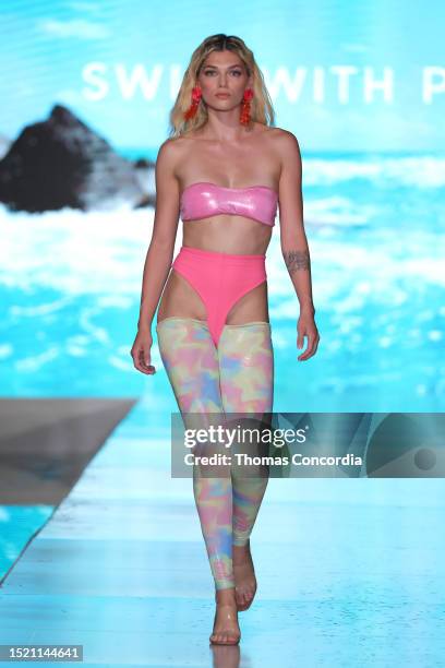 Model walks the runway for Swim With Poppies at Miami Swim Week – The Shows at SLS South Beach on July 06, 2023 in Miami Beach, Florida.