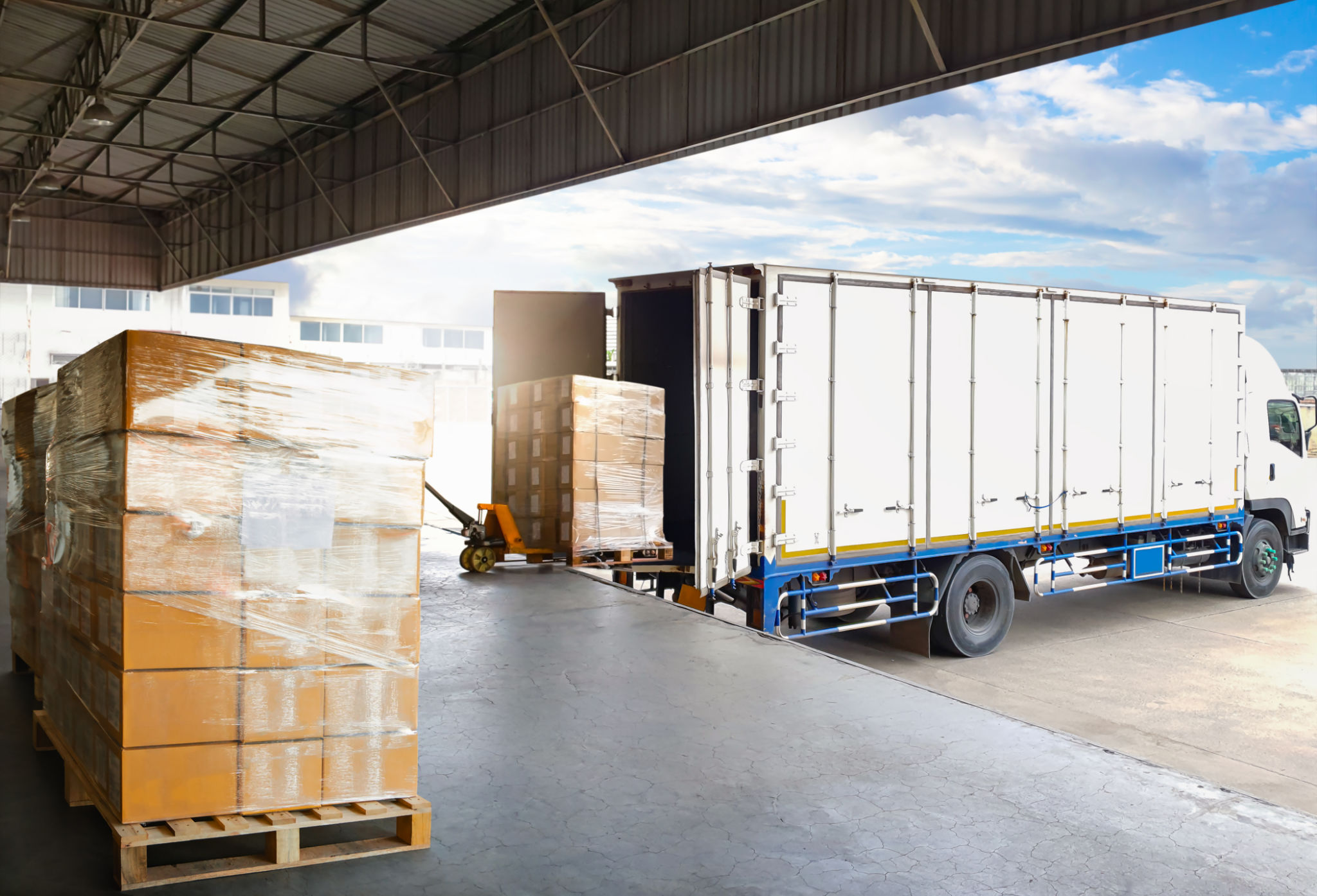 Container Trucks Parked Loading Package Boxes Pallets at Warehouse Dock. Supply Chain, Distribution Warehouse Shipping, Supplies Shipment Boxes. Freight Truck Logistic, Cargo Transport. Container Trucks Parked Loading Package Boxes Pallets at Warehouse Dock. Supply Chain, Distribution Warehouse Shipping, Supplies Shipment Boxes. Freight Truck Logistic, Cargo Transport.