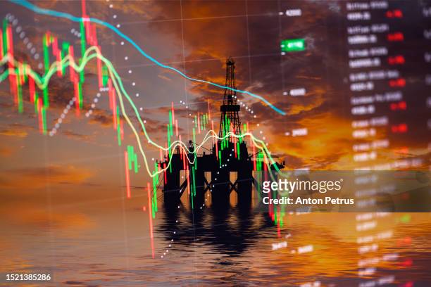 oil platform on economic data background. world oil industry - opec stock pictures, royalty-free photos & images