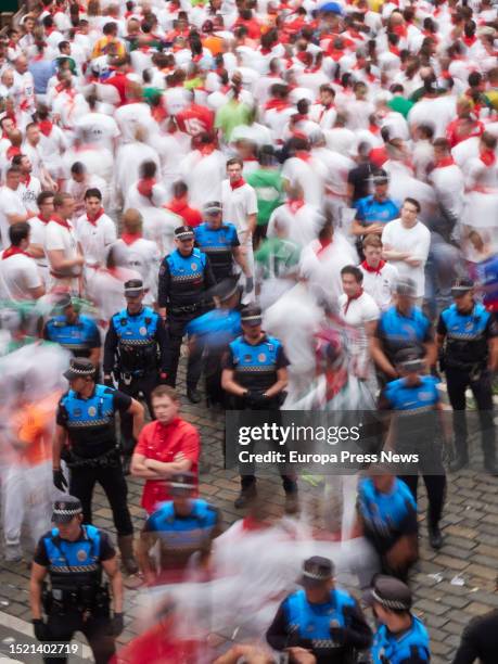 National Police officers during the first running of the bulls of the Fiestas de San Fermin 2023, with bulls from Puerto de San Lorenzo, on July 7 in...